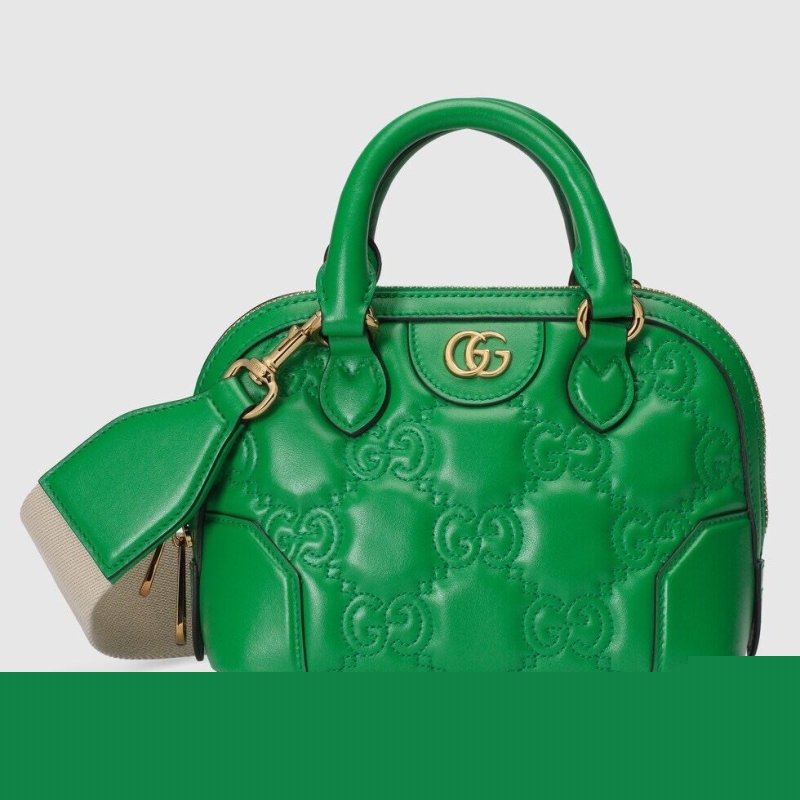 G*u*i top handle bags